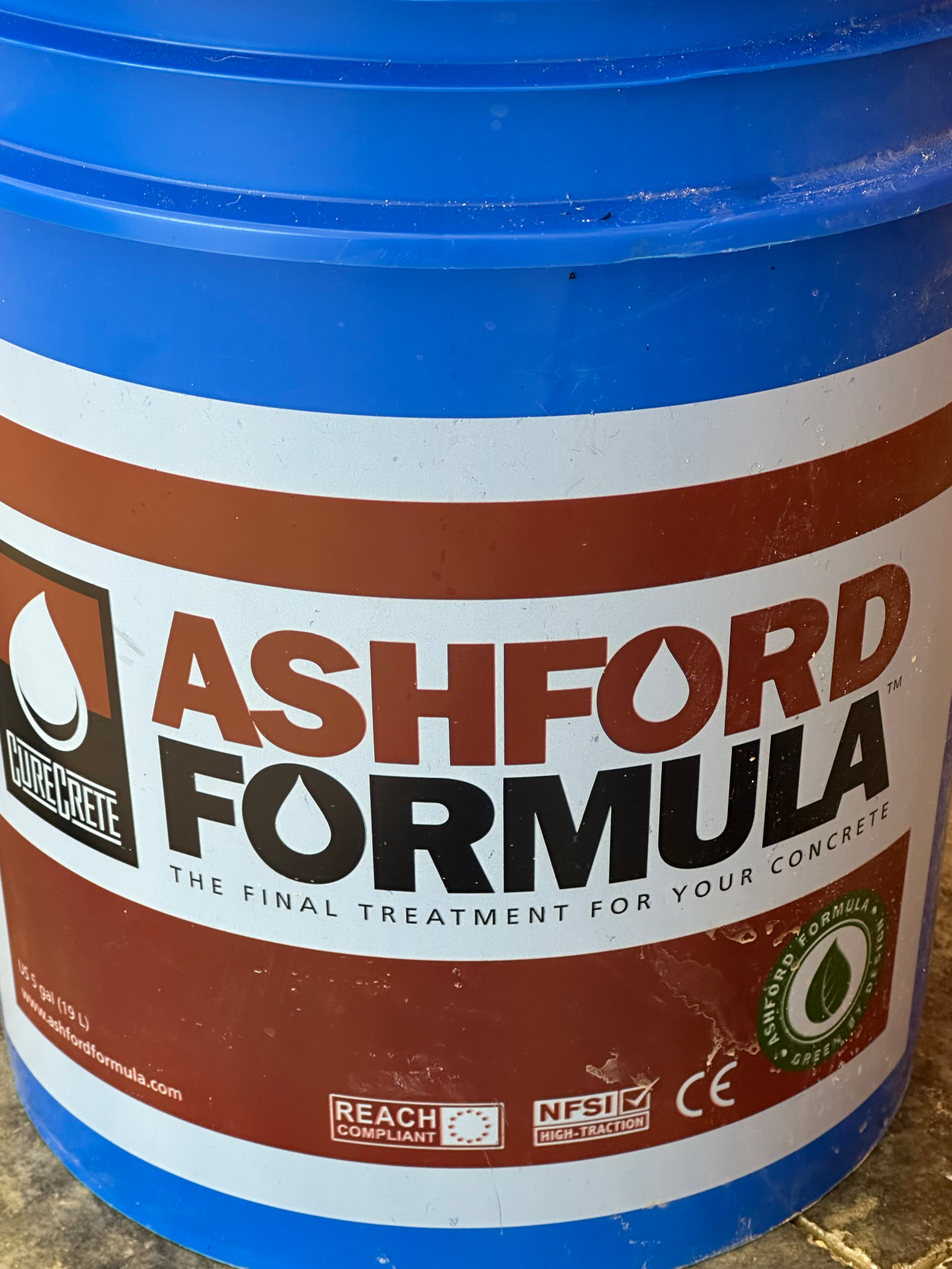 Five gallon pail of Ashford Formula concrete densifier by Curecrete