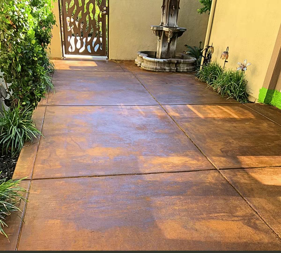 Cola acid stain on a finished concrete floor